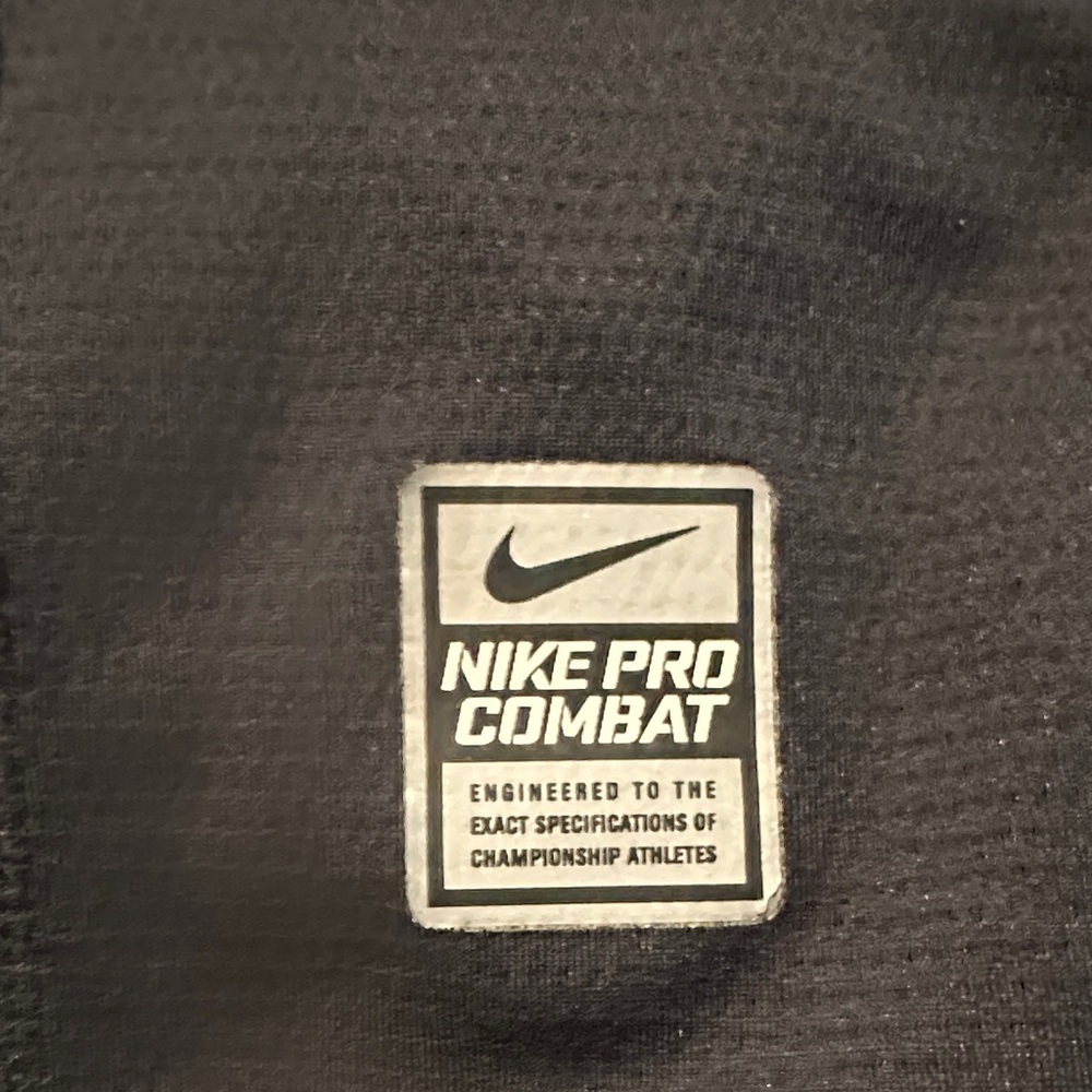 Nike Black Athletic Top with White Nike Pro Combat Patch